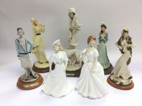 Seven figures of ladies comprising Royal Doulton,