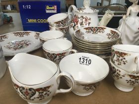 A Colclough tea set decorated with a floral patter