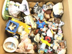 A Box Containing various Resin Figures.