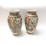 A pair of Japanese satsuma vases decorated with fi