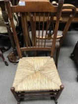 A elm stick back rocking chair with rush seat- NO