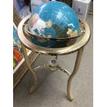 A floor globe, approximately 90cm tall. this lot cannot be posted