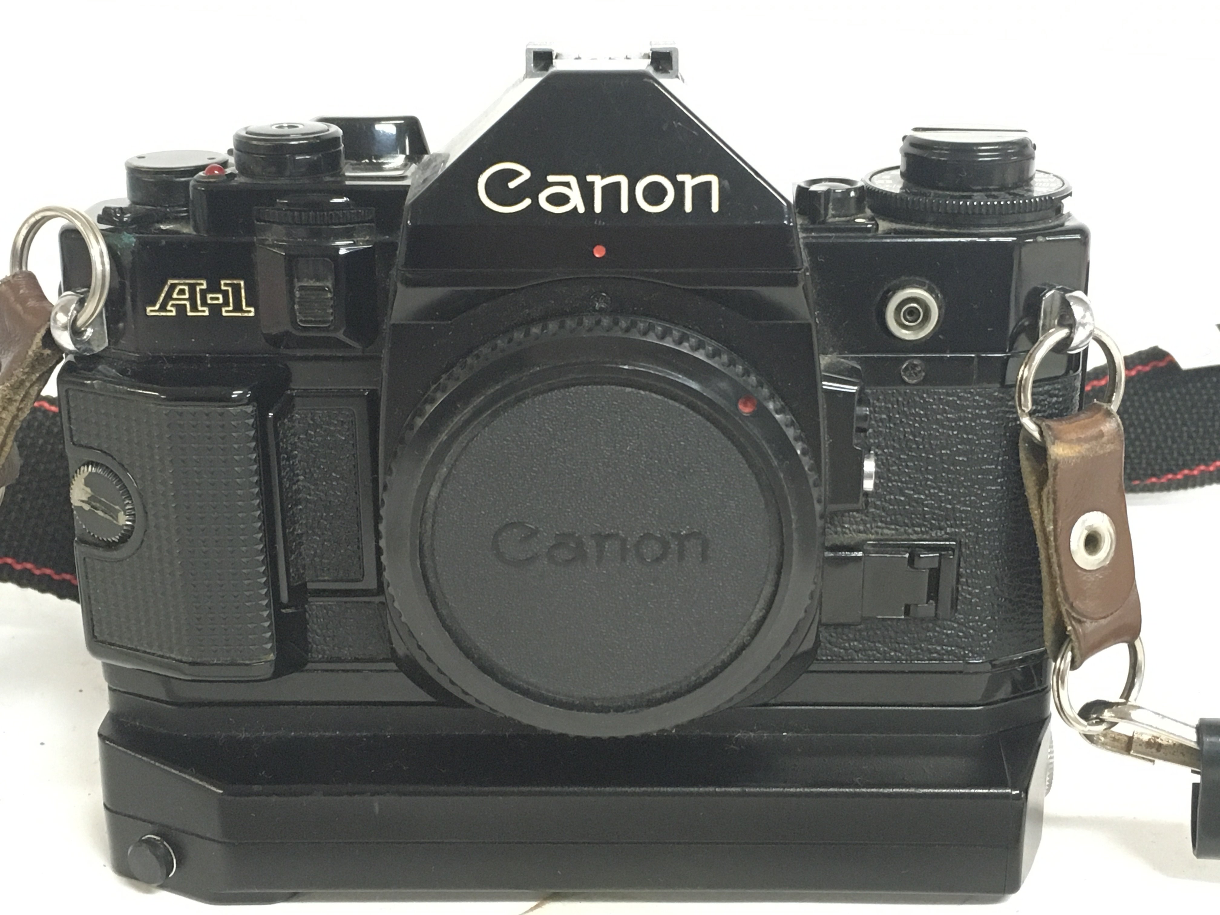 A Canon A-1 camera including FD 70-210 1:4 lens, F - Image 2 of 7