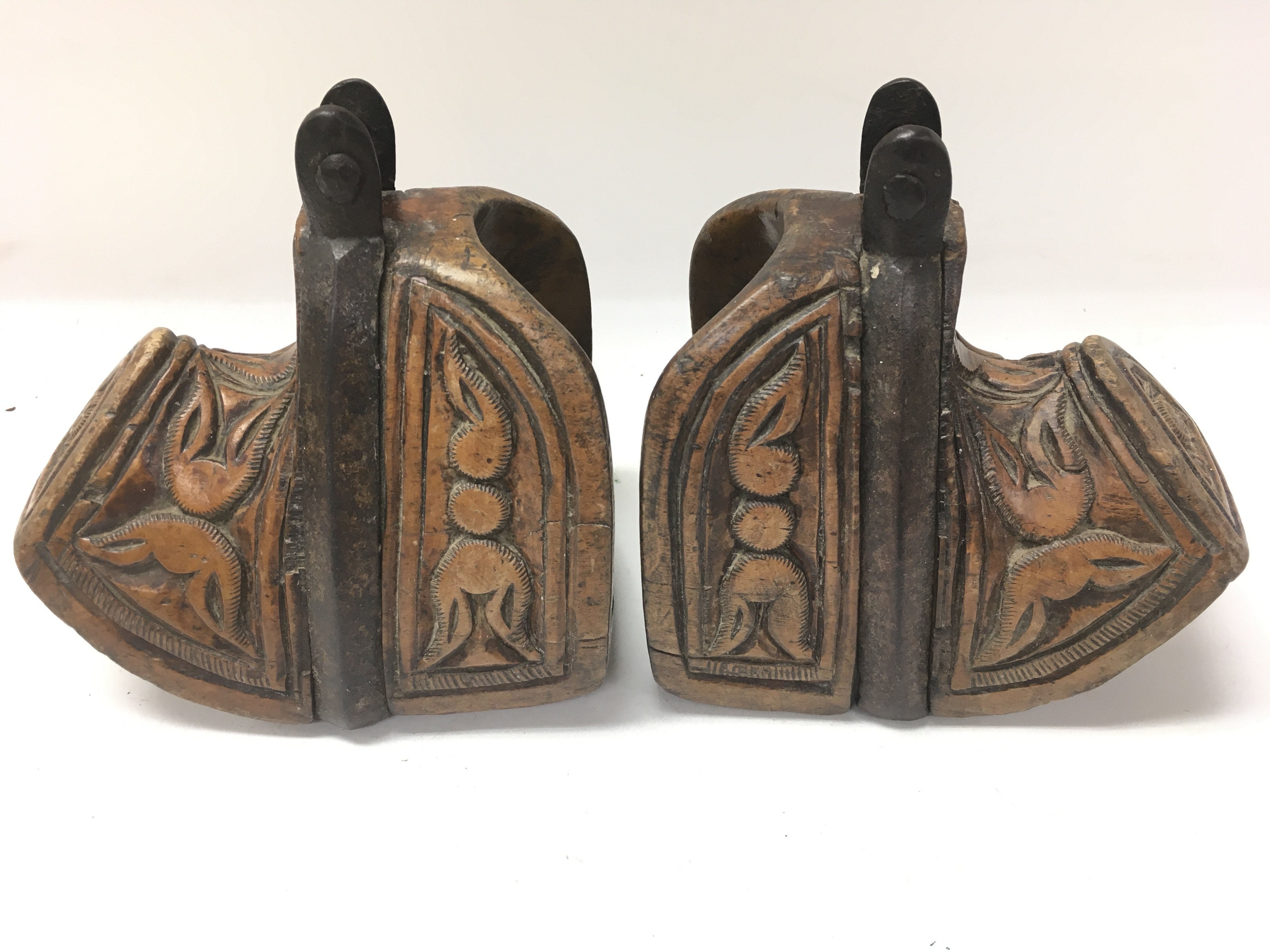 A pair of old carved possible South American stirr - Image 2 of 3