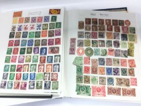 A collection of world stamp albums including QE2 j