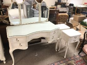 A French style white wood dressing table with mirr