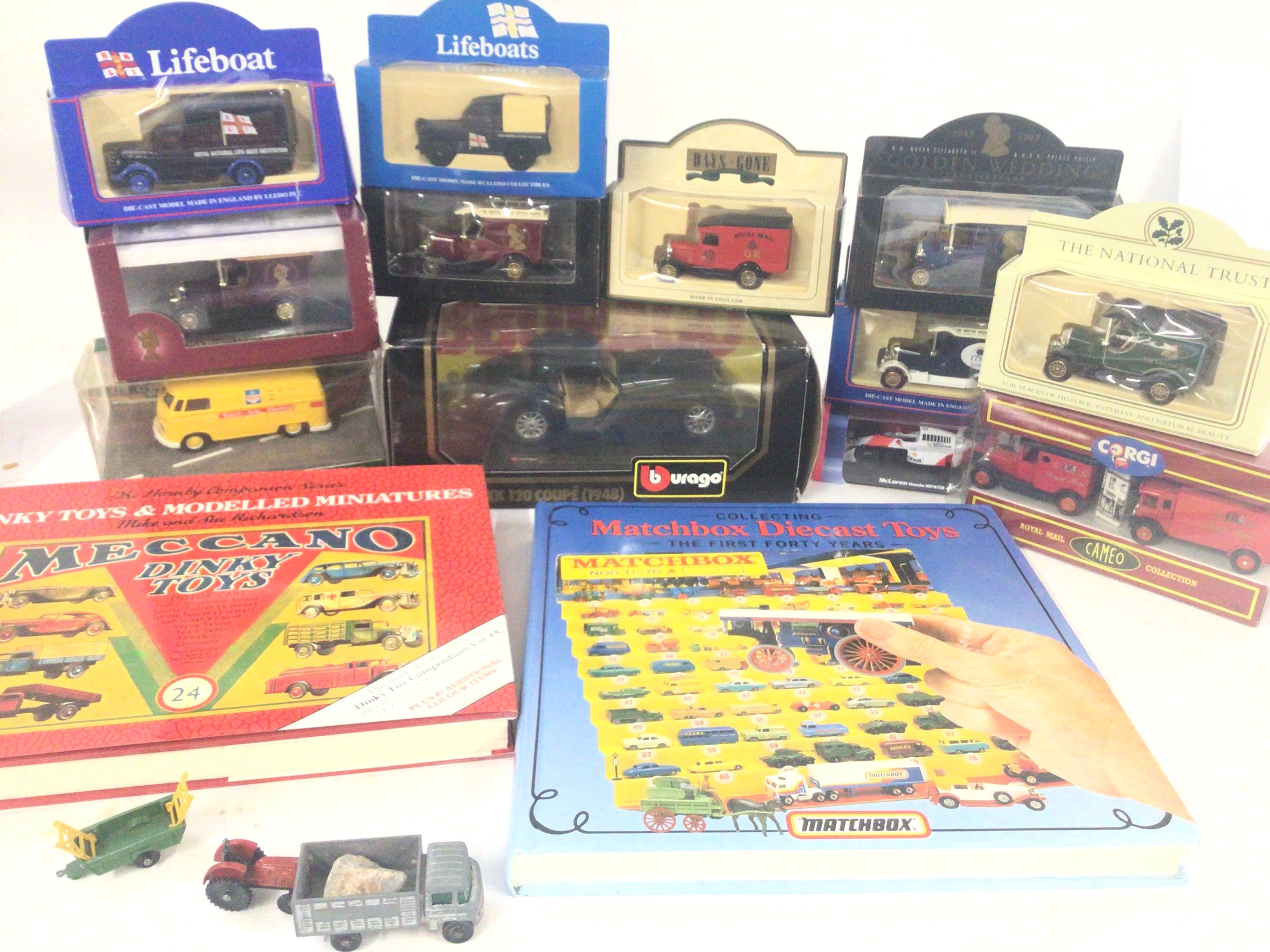 A Collection of boxed Modern Diecast Buses. Lorries.Cars including Days gone and collectors books.