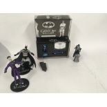 A collection of Batman figures including boxed lim