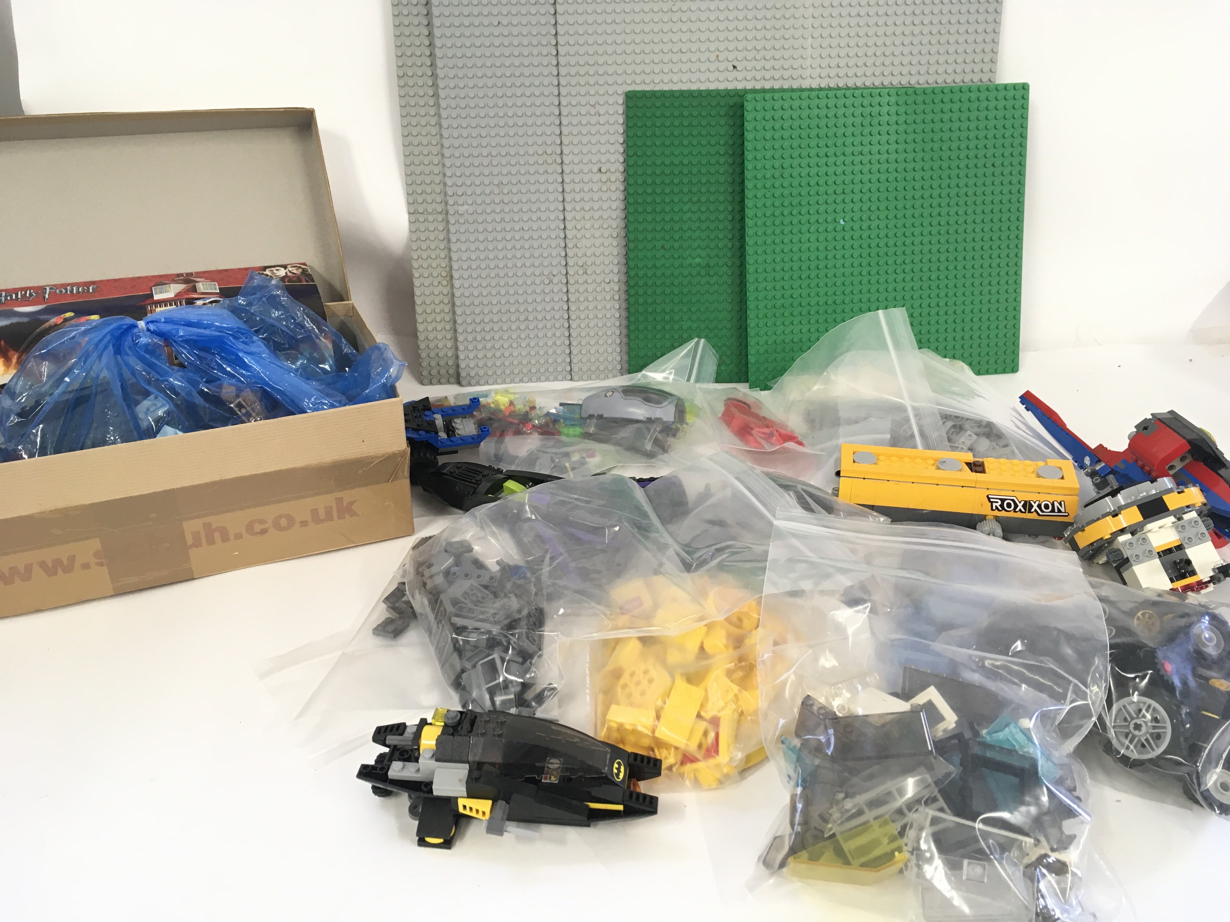 A box contains approximately 8 kg of Lego pieces a