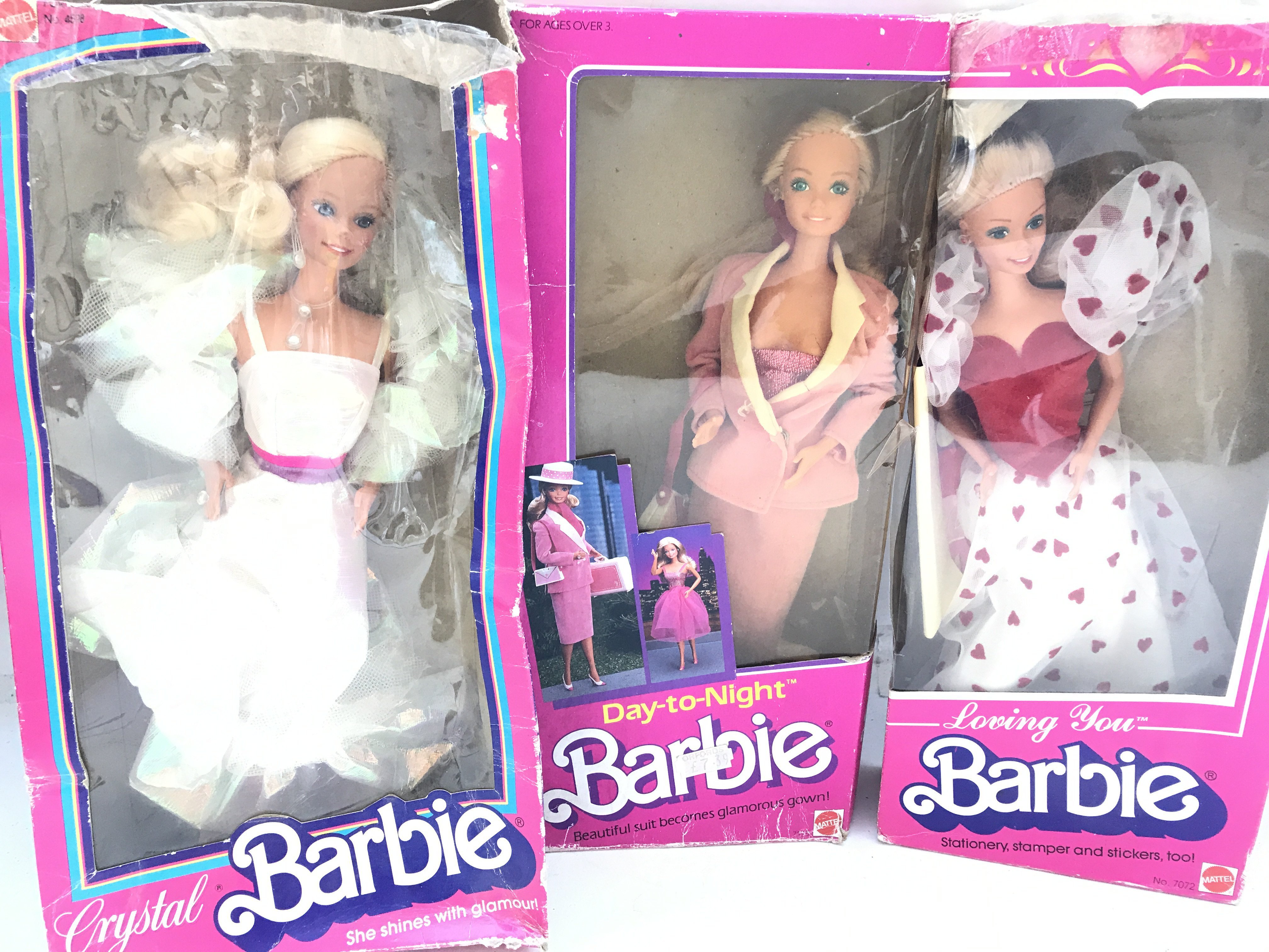 3 Boxed Barbies. A Crystal Barbie. A Day And Night