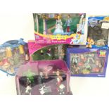 A Collection of Boxed Disney Playsets and Figures.