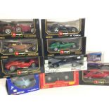 A Collection of Burago. UT Models. And Mira Diecast Vehicles. All 1:18 Scale and Boxed.