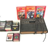 A Atari 2600 with A Collection of Games.(2).