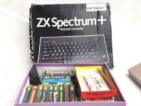 A Boxed Sinclair Spectrum+ and a Collection of Gam