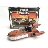 A Boxed Vintage Star Wars Land Speeder.