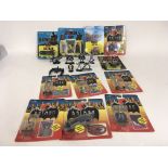 A collection of Batman figures. 11 carded unopened