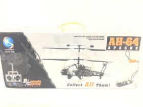 A Boxed Chuang Sheng Remote Controlled AH-64 Apache Helicopter. NO RESERVE
