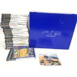 A Boxed Sony Playstation 2 with a Collection of Ga