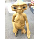 A Large Fibre Glass Figures of E.T. Possibly a Shop Display approx Height 87 Cm.