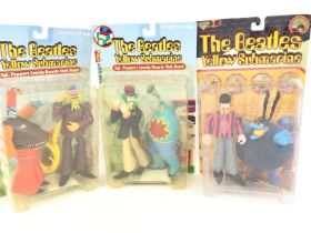A Collection of McFarlane Toys the Beatles Yellow Submarine.