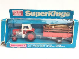 A Boxed Machbox Massey Ferguson Tractor and Traile