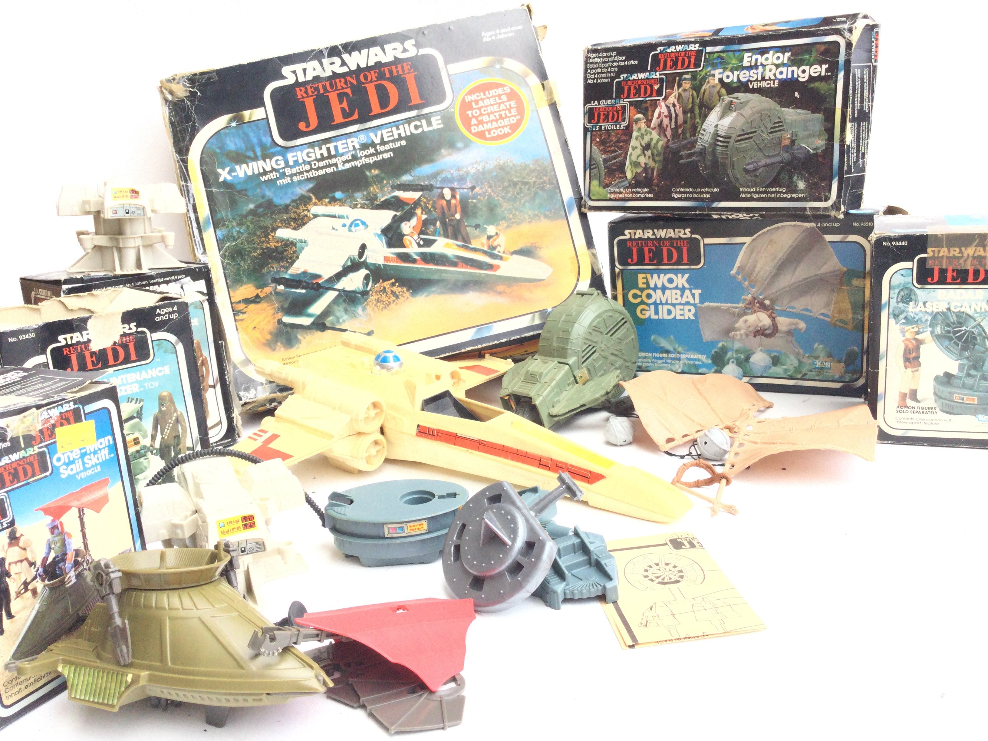 A Collection of Boxed Vintage Star Wars toys inclu