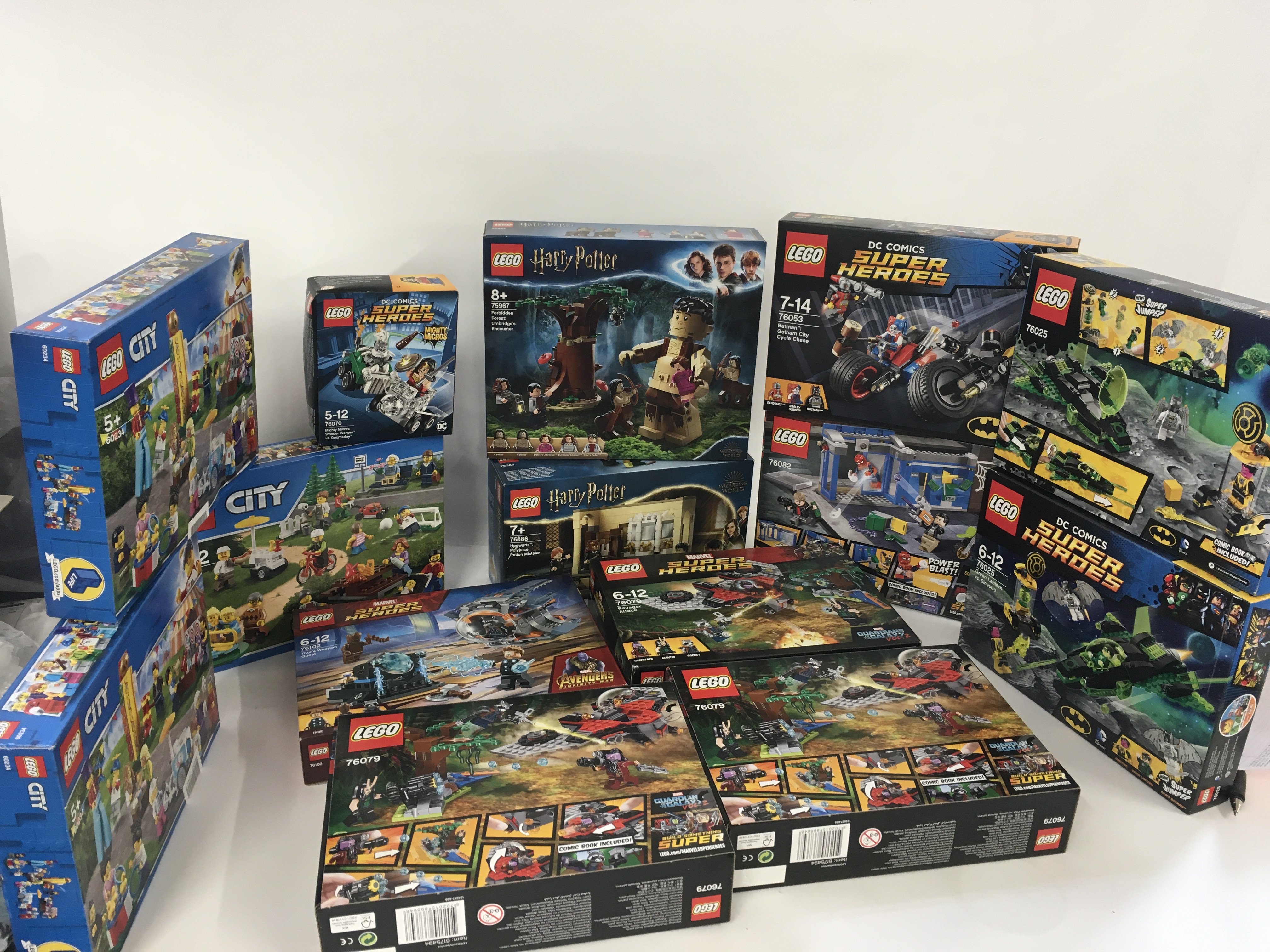 A collection of 19 unopened boxed Lego sets with v