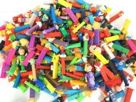A Box Containing a Large Collection of Pez Dispensers.