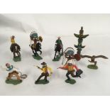 A collection of plastic cowboy and Indians by Swop