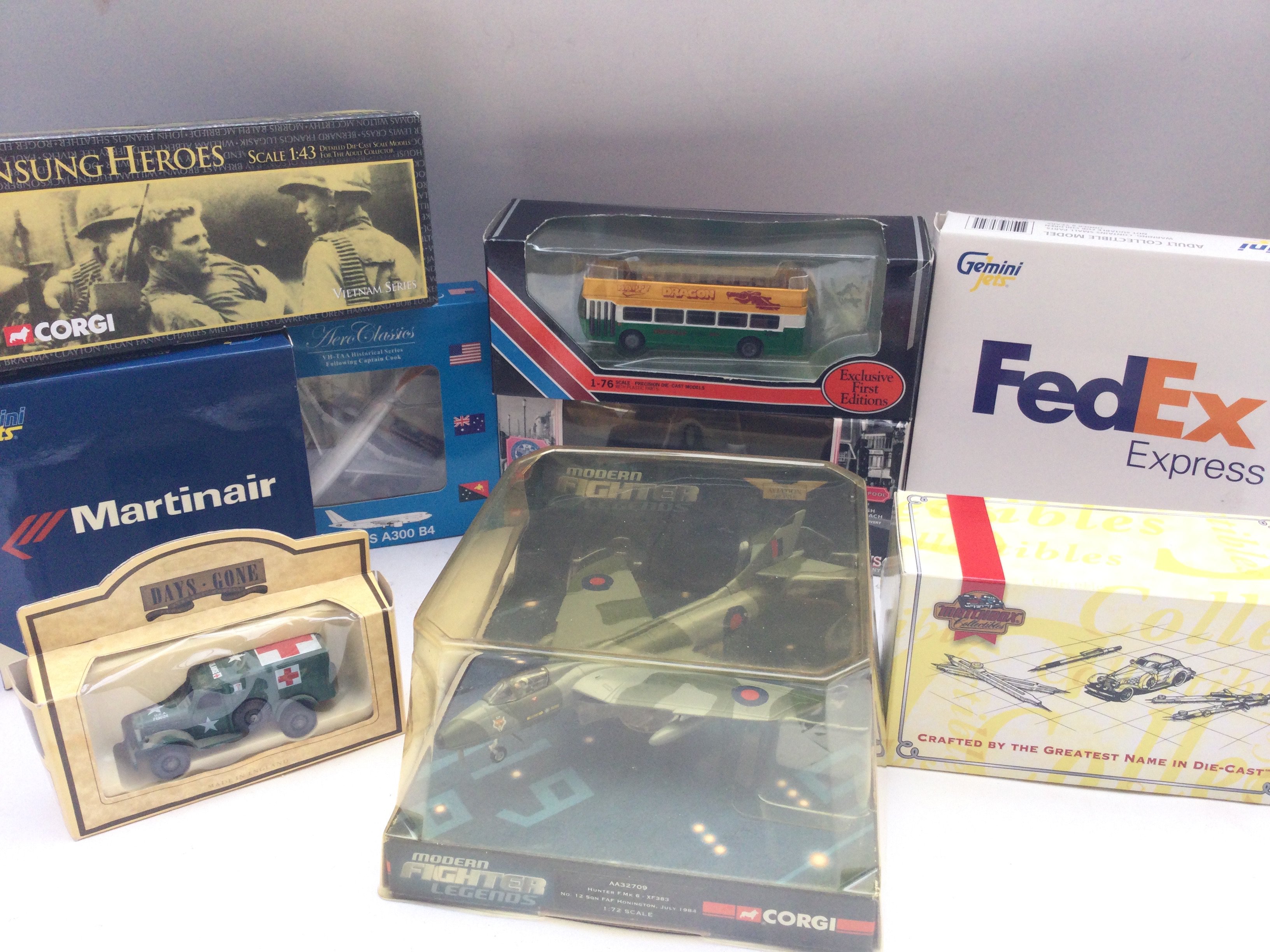A Collection of Boxed Diecast Including Corgi, mat