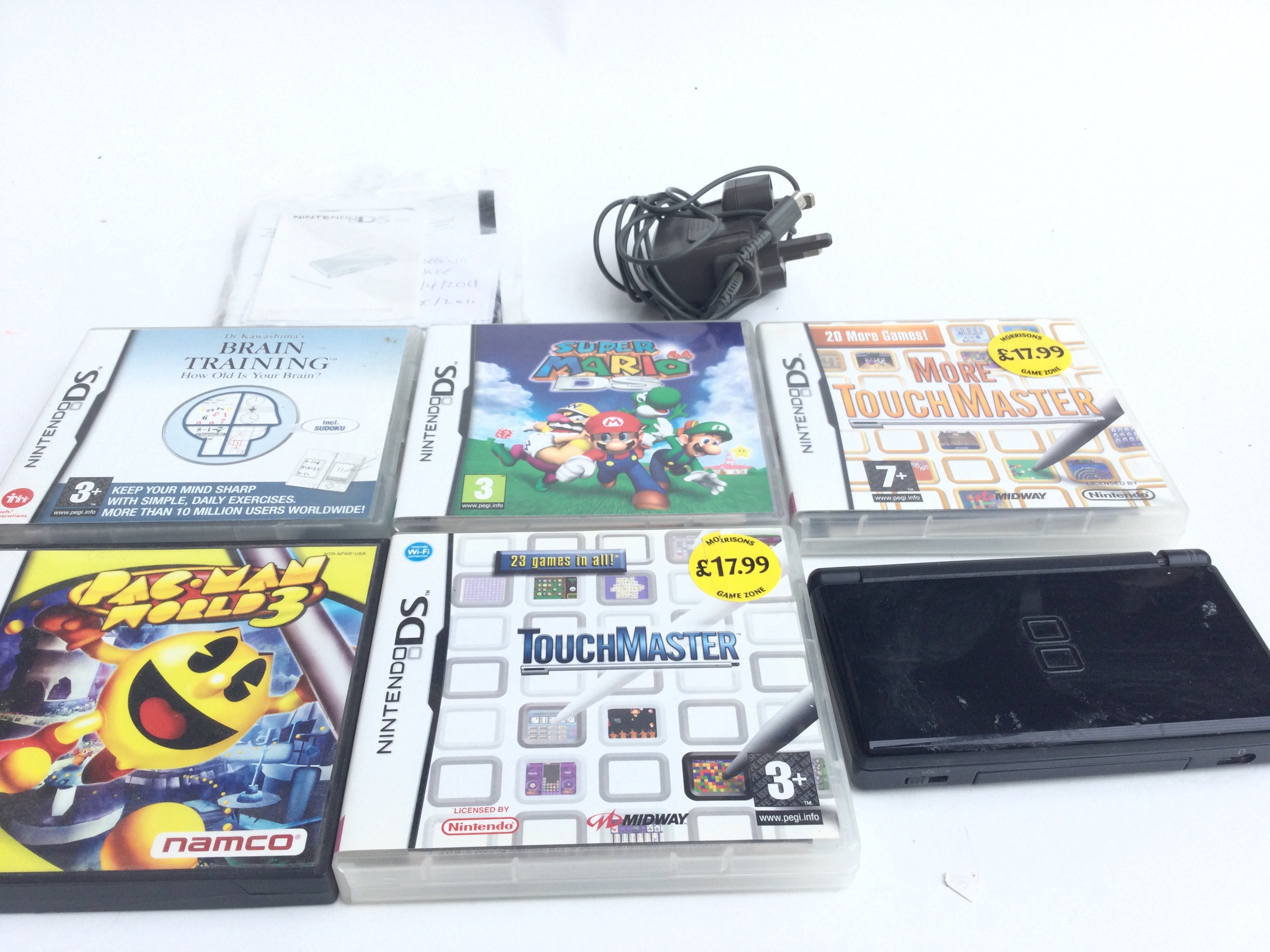 A Boxed Nintendo DS Light and 5 Games. - Image 2 of 3