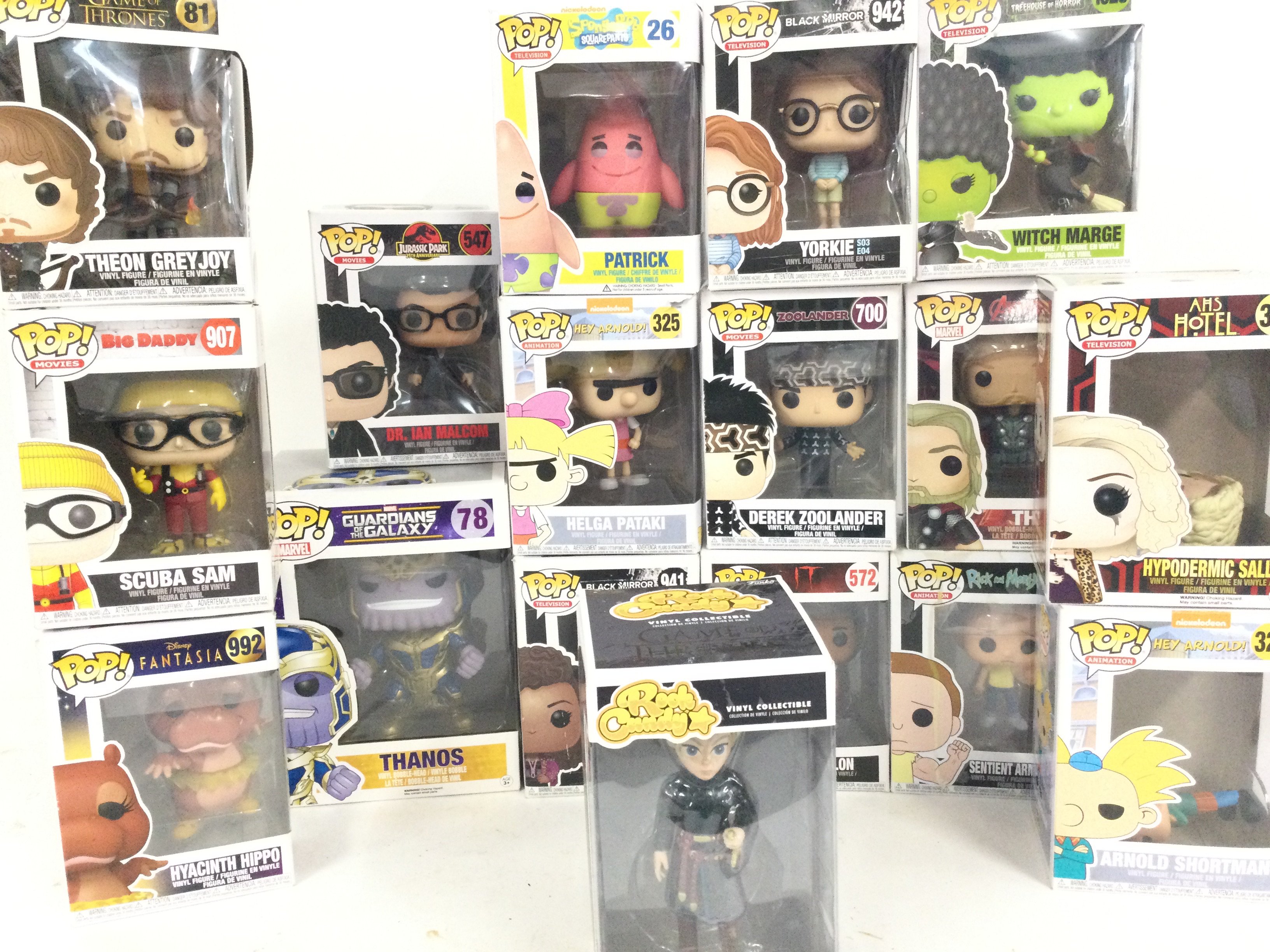 A Collection of Boxed Funko Pop Figures.