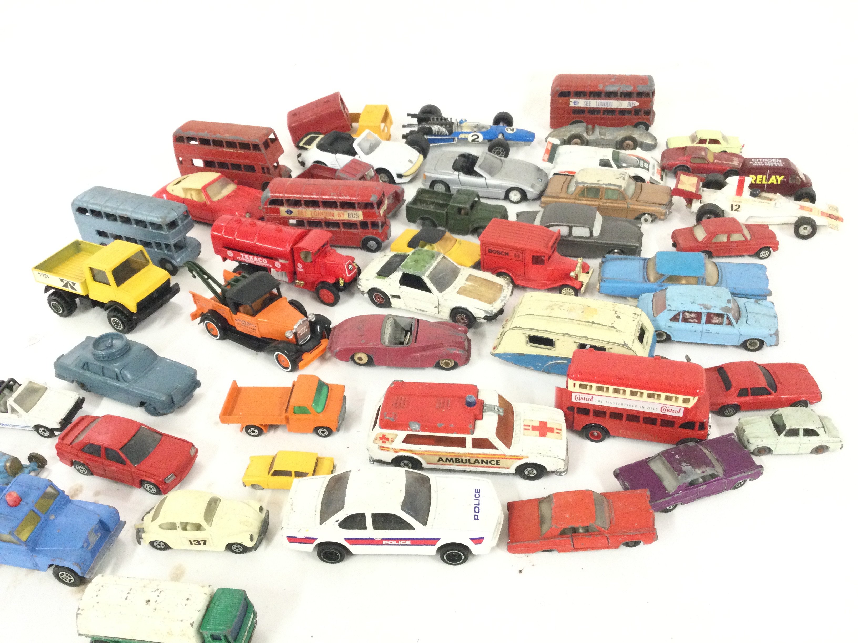 A Box Containing Playworn Diecast. Including Match