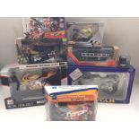 A Collection of Boxed Diecast Including motor raci