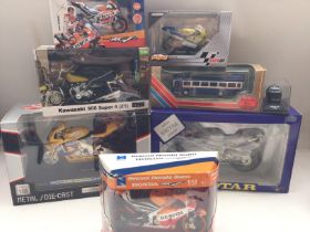 A Collection of Boxed Diecast Including motor raci