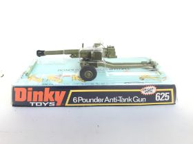 A Boxed Dinky 6 Pounder Anti Tank Gun #625 and 3 Boxed Matchbox Cars (1 in Wong Box).