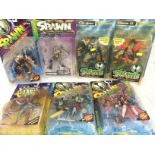 A Collection of Boxed Spawn Figures.