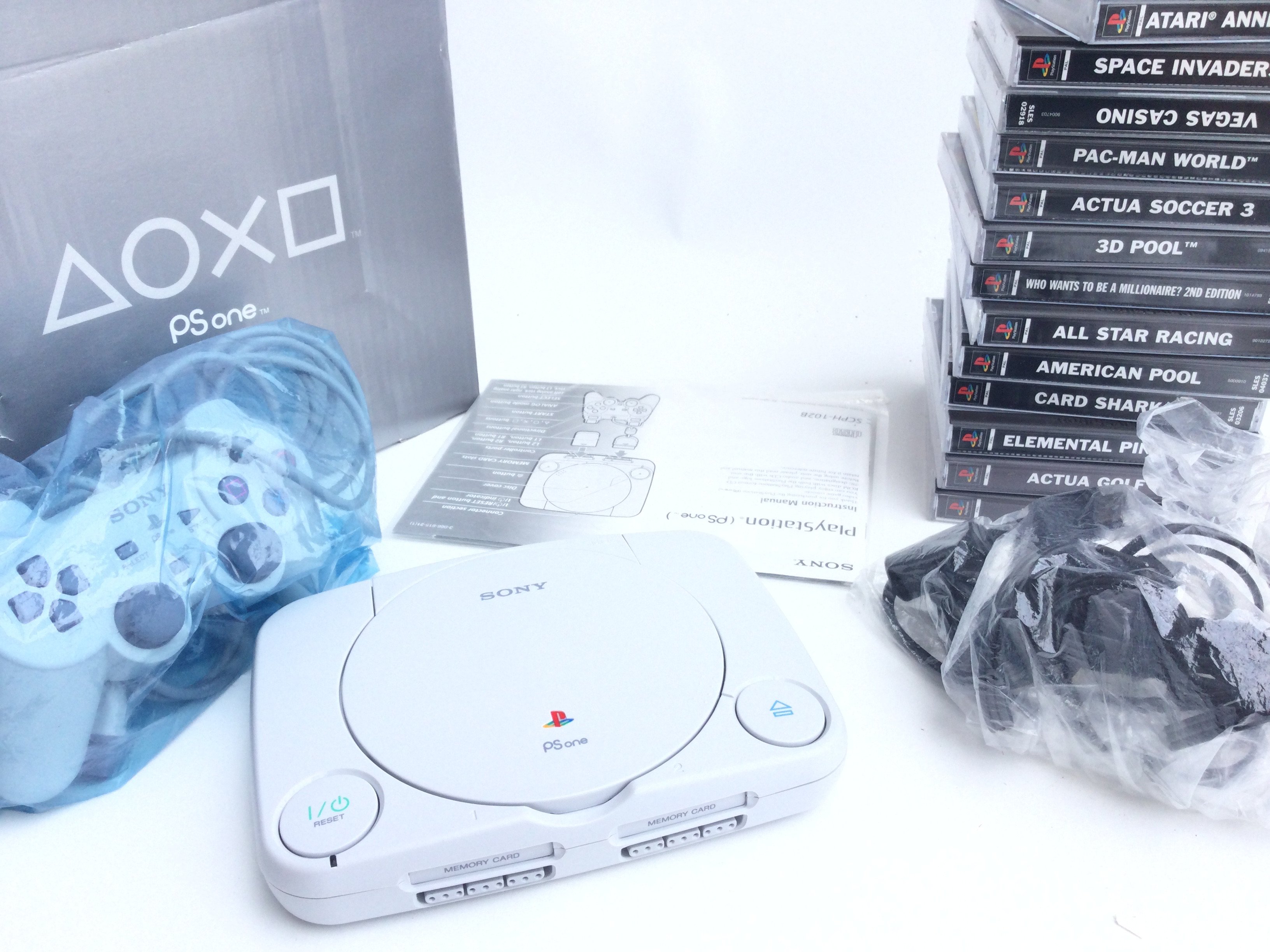 A Boxed Sony PlayStation 1 Slim and a collection o - Image 2 of 2