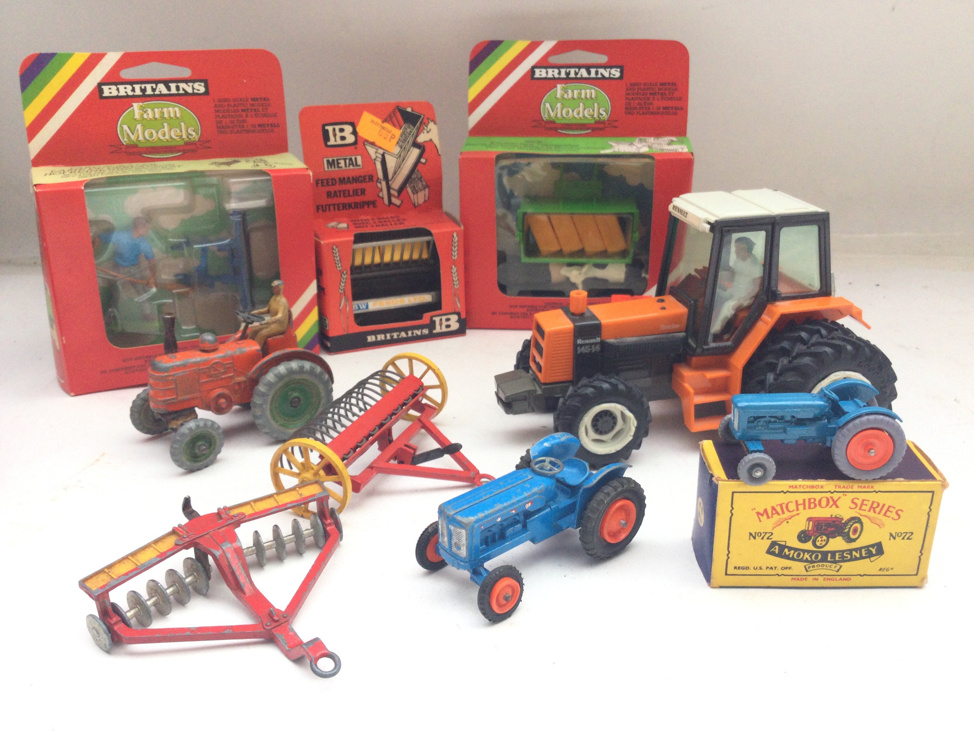 A Collection of Britains Farming Implements. A Col