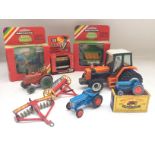 A Collection of Britains Farming Implements. A Col