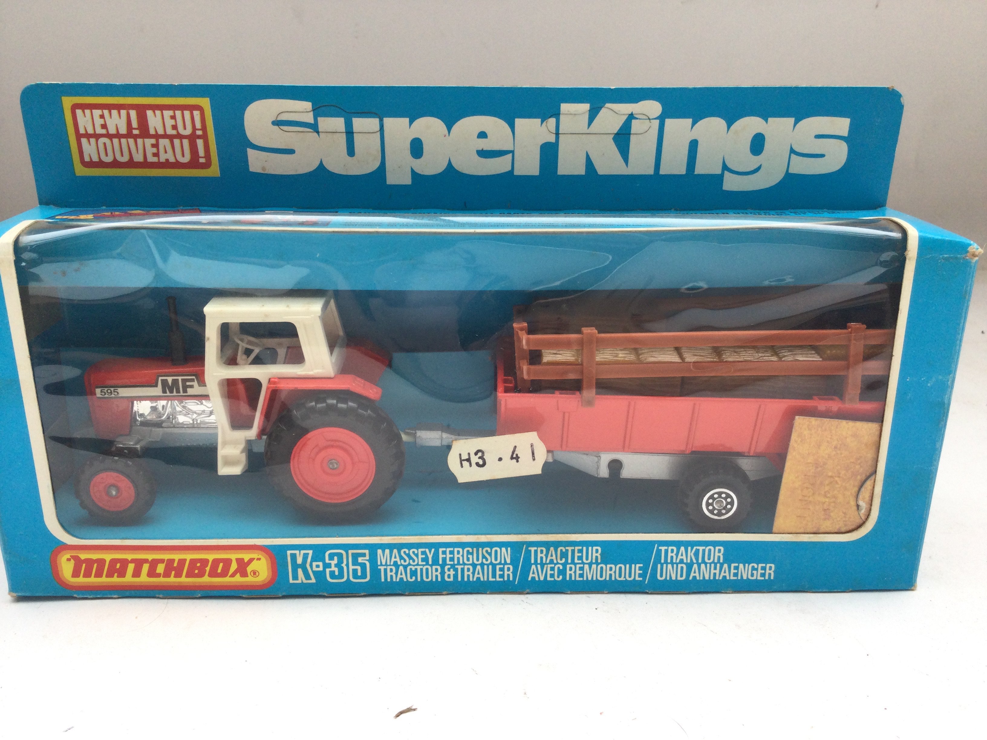 A Boxed Matchbox Massey Ferguson Tractor and Trail