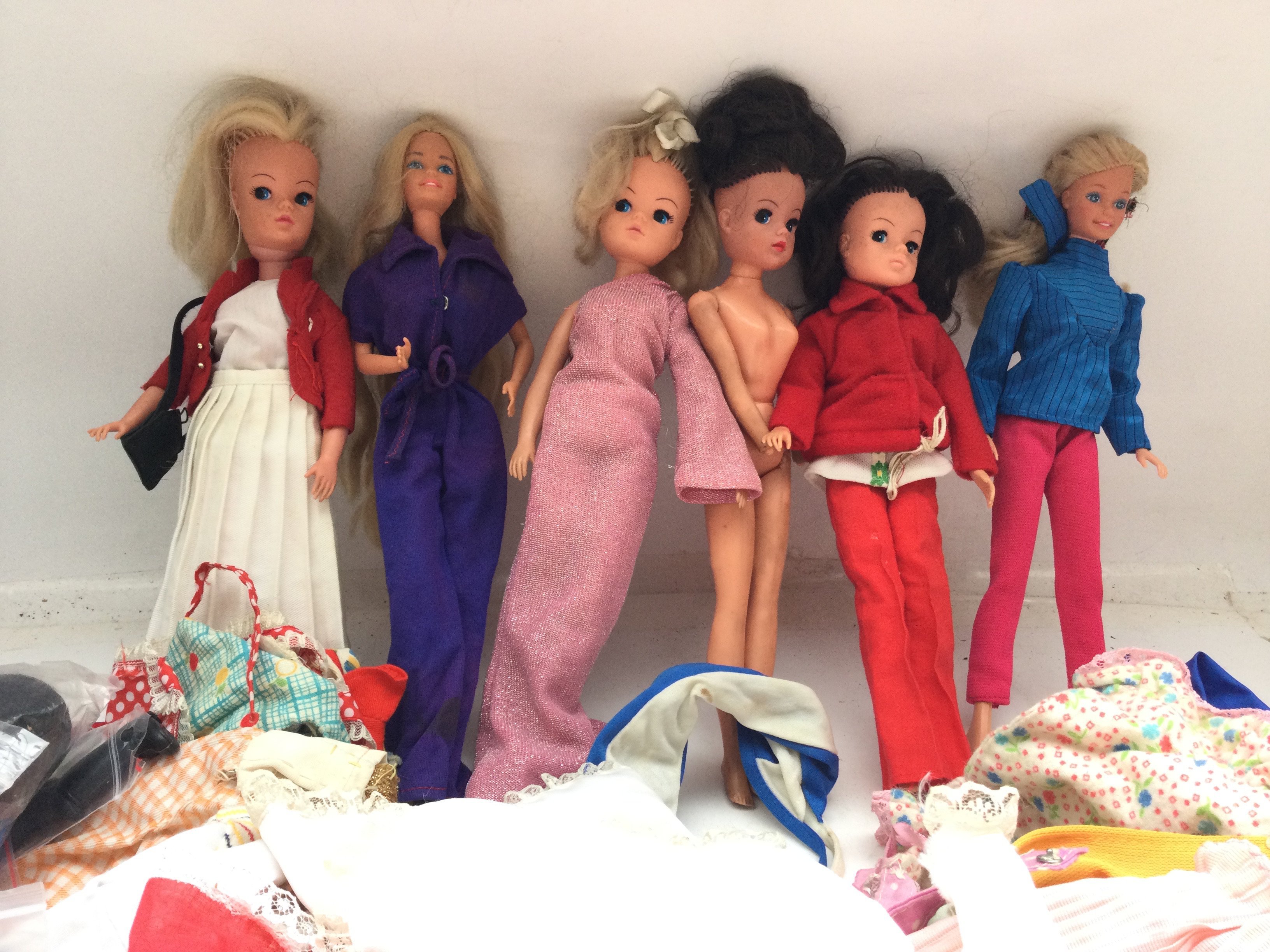 A Collection of Vintage Sindys and Barbies and a C