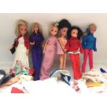 A Collection of Vintage Sindys and Barbies and a C