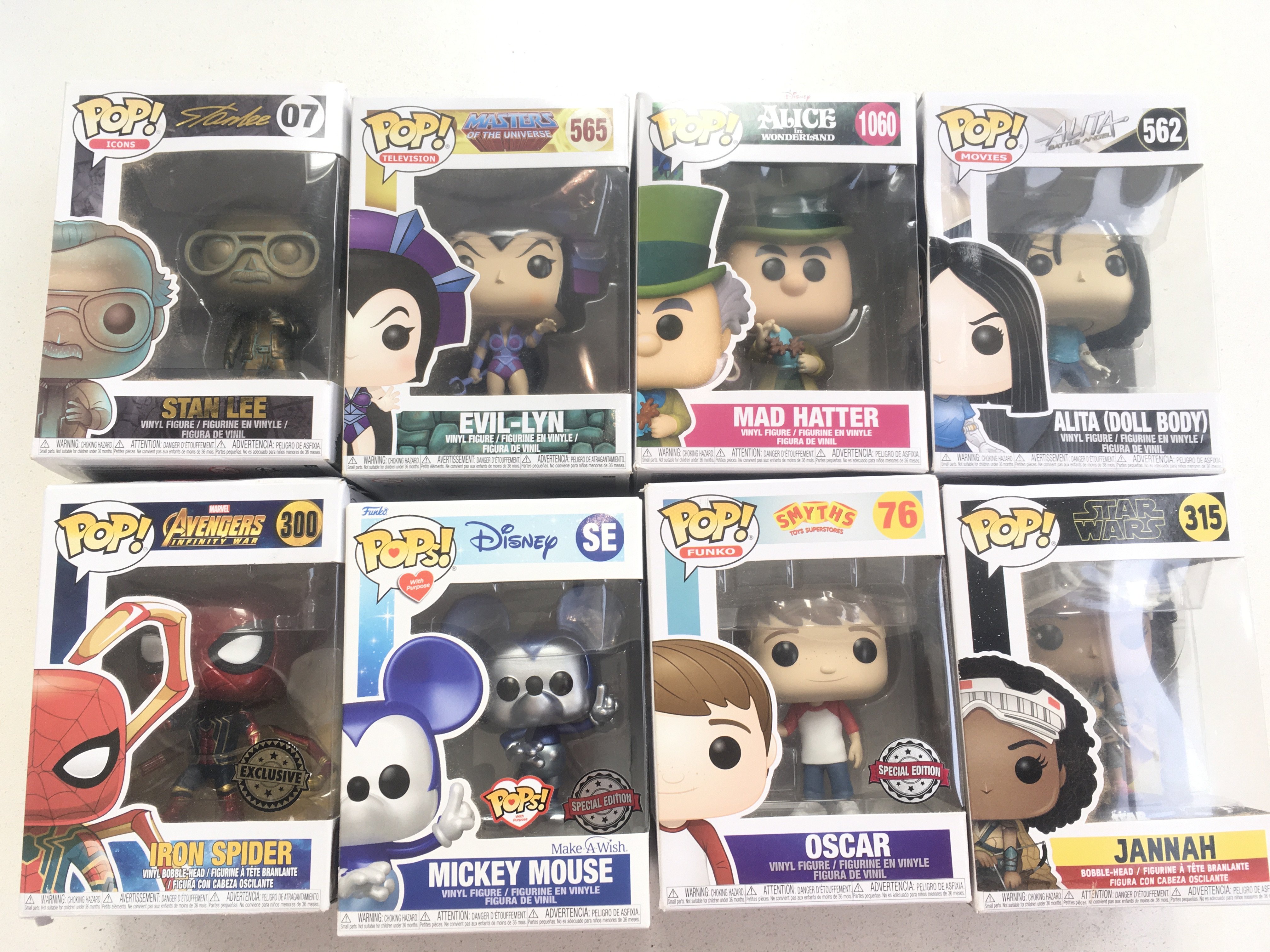 A collection of 8 boxed POP figures including one