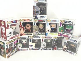 A collection of 12 boxed funko pop figures.