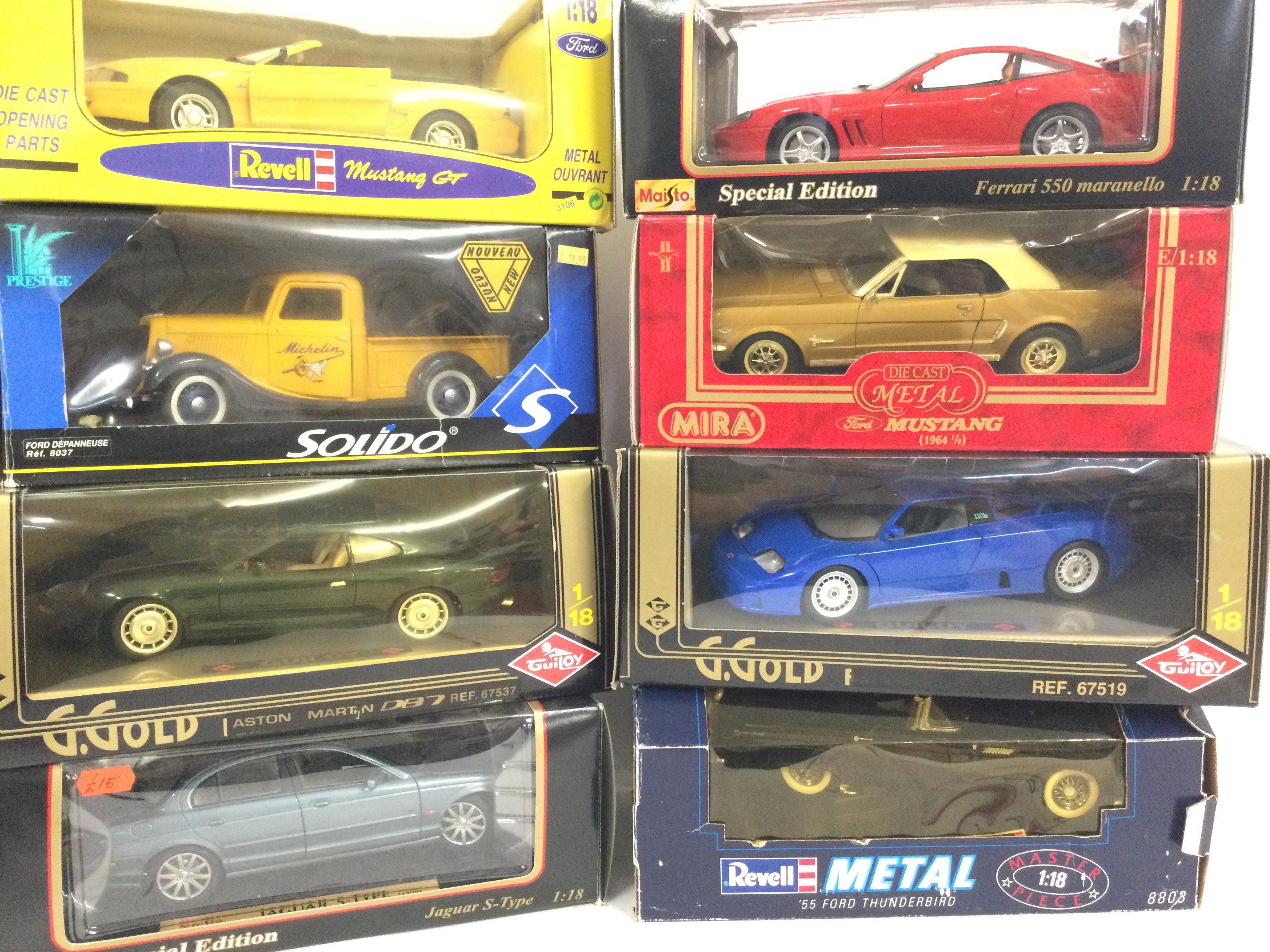 A Collection of Boxed Diecast Vehicles all 1:18 Scale.