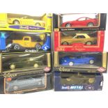 A Collection of Boxed Diecast Vehicles all 1:18 Scale.
