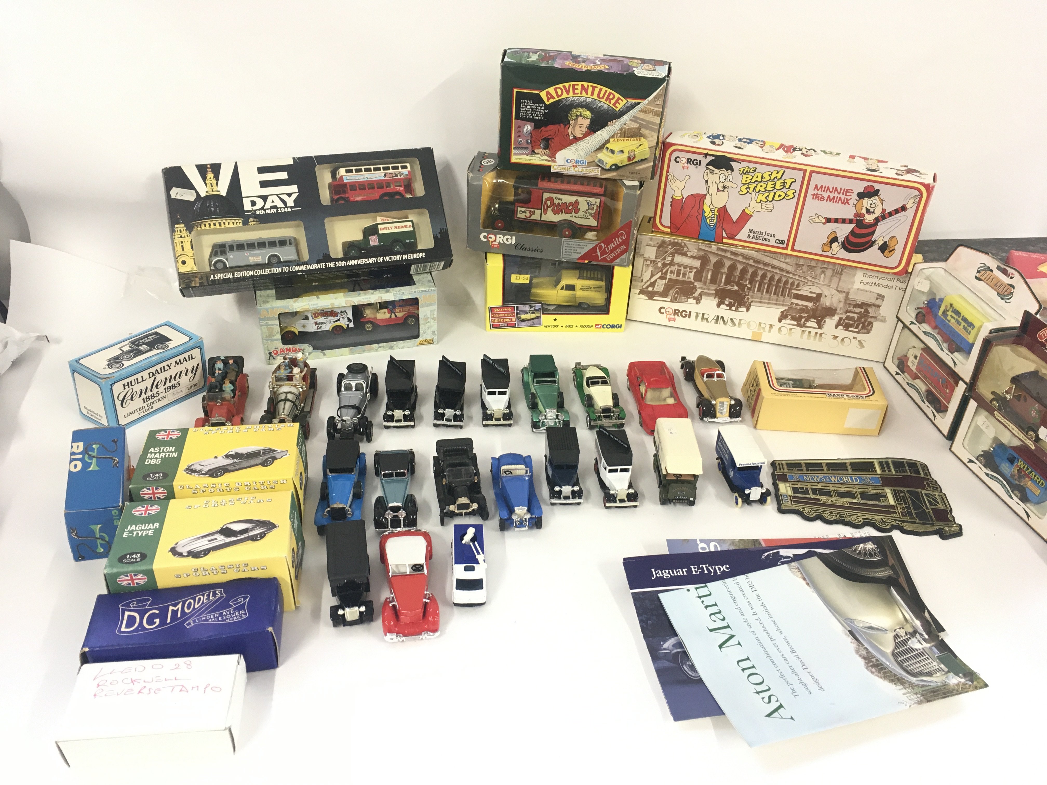 A mixed collection of model cars some boxed and so