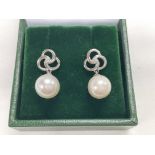 Paid of 9ct white gold round freshwater pearl and