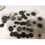 A collection of bronze coinage and other small sil